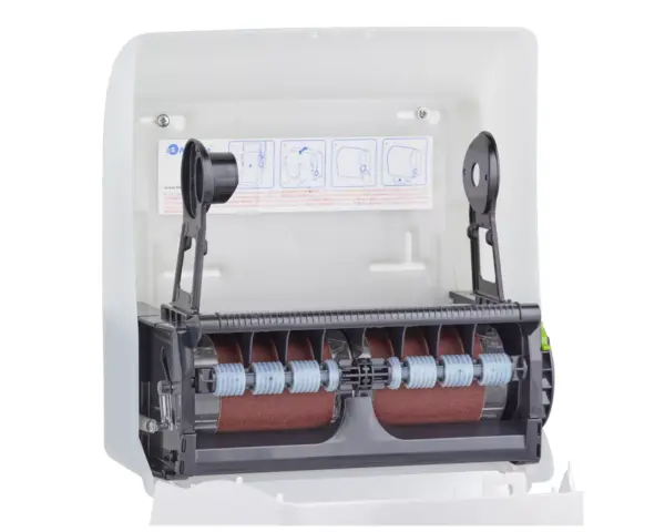 Mechaniczny podajnik ręczników papierowych w rolach MERIDA SOLID CUT AUTOMATIC MAXI, tworzywo ABS, front pełen biały - mat, tył transparentny jasny - mat Wnętrze podajnika MERIDA SOLID CUT MAXI z załadowaną rolką MAXI 250m